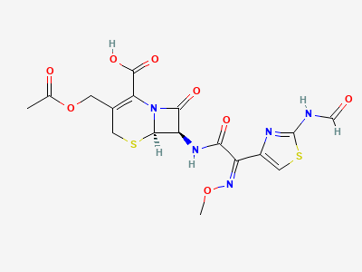 (6R,7R)-3-[(acetyloxy)methyl]-7-[[(2Z)-2-[2-(formylamino)thiazol-4-yl]-2-(methoxyimino)acetyl]amino]-8-oxo-5-thia-1-azabicyclo[4.2.0]oct-2-ene-2-carboxylic acid (N-formylcefotaxime) Structure